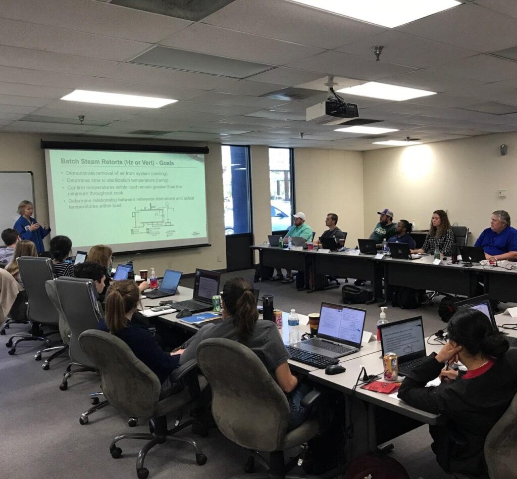 students in classroom learning about thermal processing