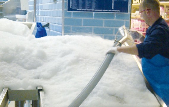 Pneumatic flake ice dispension system