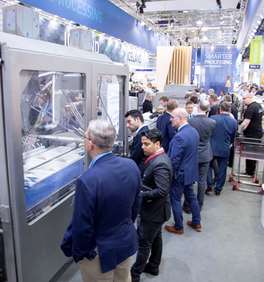 Customers looking at machine