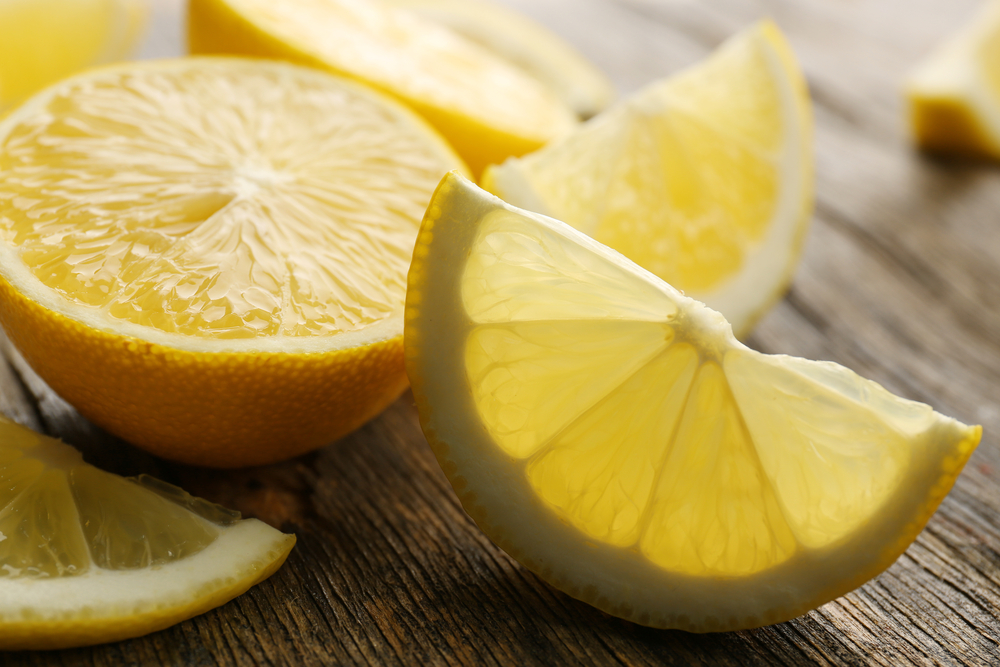 sliced lemons on a table