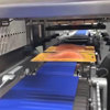 Automatic inline tray sealing
